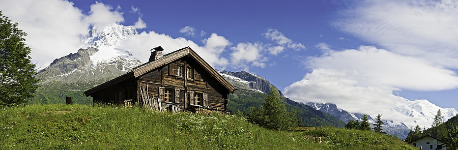 Idyllic Alpine chalet summer wildflower meadow panorama Photograph by fotoVoyager