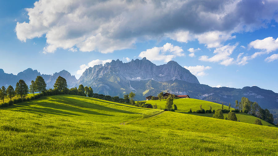 Idyllic alpine scenery, farmhouse in front of Wilder Kaiser, Austria, Tirol  - Kaiser Mountains Photograph by DieterMeyrl