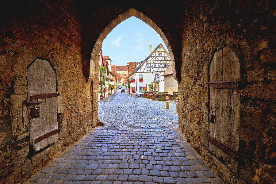 Idyllic German cobbled street. Tower gate passage and street arc Photograph by Brch Photography
