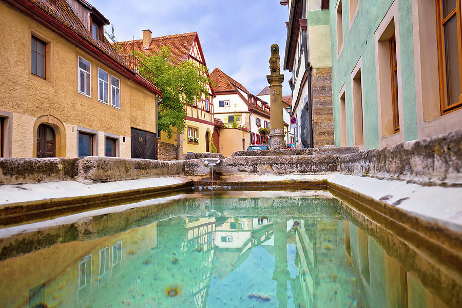 Idyllic Germany. Colorful street and fountain in medieval German Photograph by Brch Photography