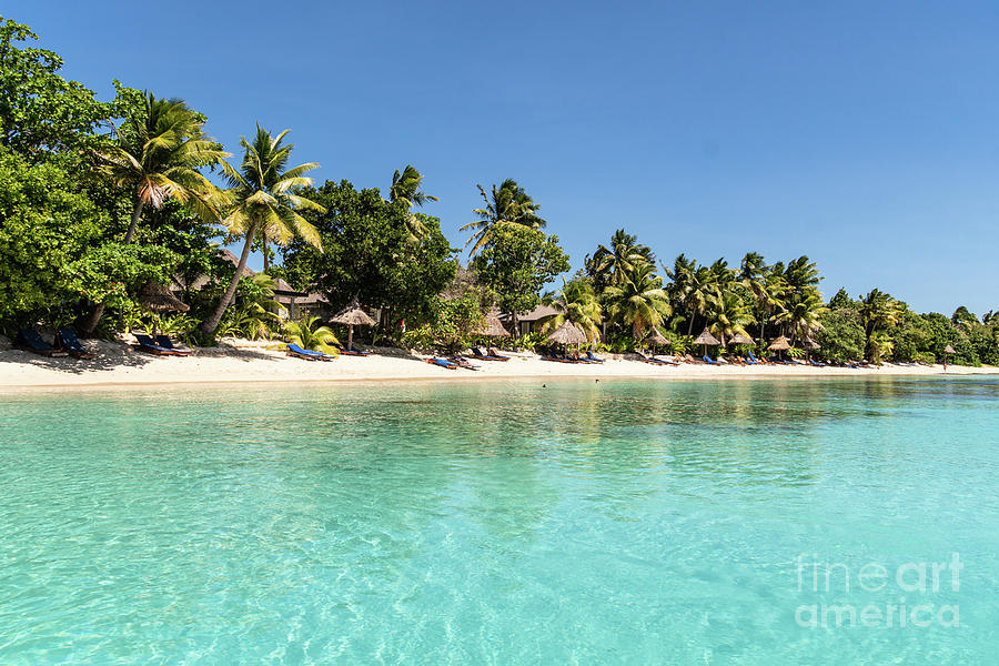 Idyllic turquoise water by an exotic beach in the Yasawa island  Photograph by Didier Marti