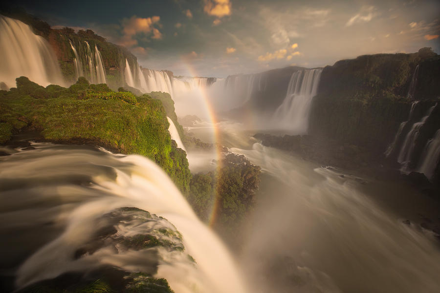 Iguazu falls waterfalls at sunset. Photograph by Alex Saberi
