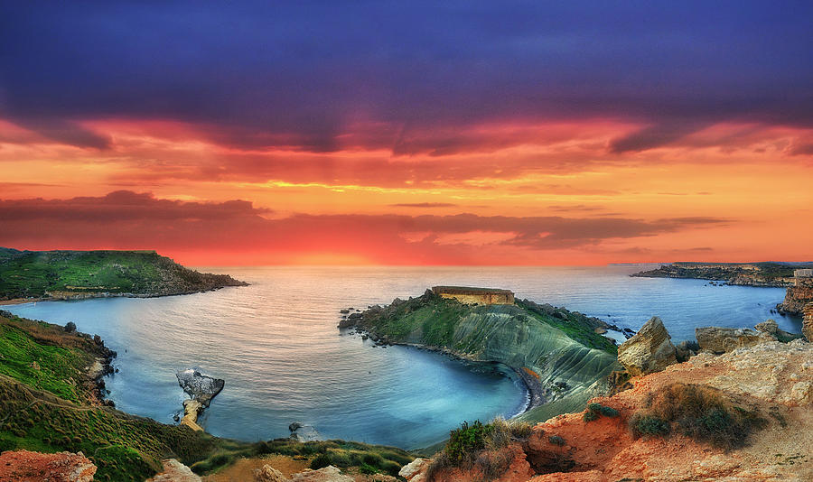 Il-Qarraba cliffs and beach at sunset in Malta - Landscape photo Photograph by Stephan Grixti