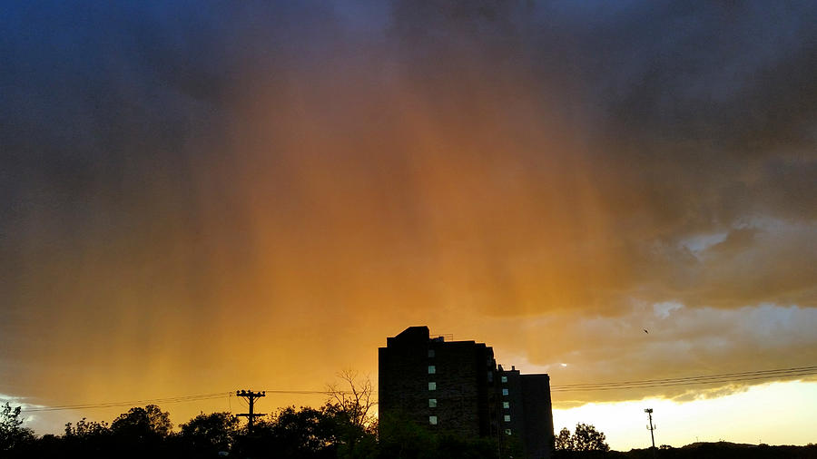 Illuminated Rain Shaft Photograph by Ally White