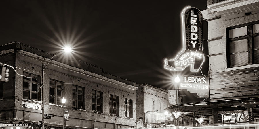 Illuminating The Stockyards Cityscape And Cowboy Boot Neon - Sepia Panorama Photograph by Gregory Ballos