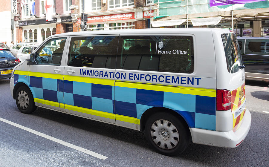 Immigration Enforcement Photograph by Lpettet