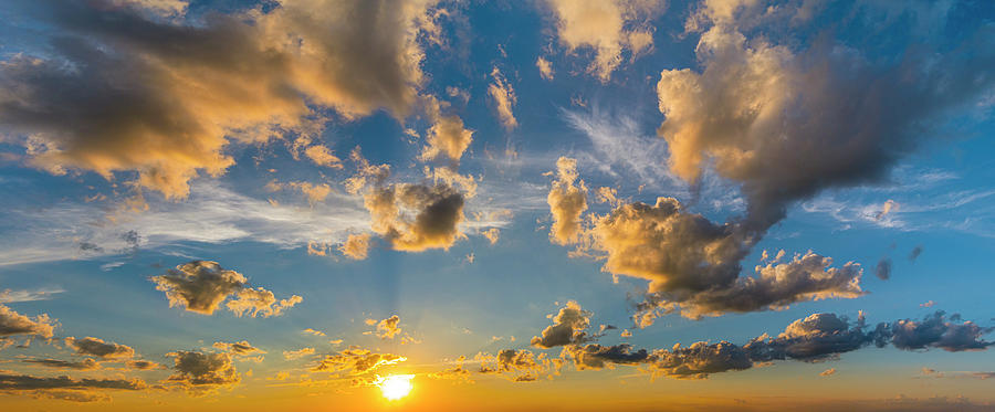 Incredible Aerial Sunset With Big Billowy Clouds Floating In Blue Sky ...