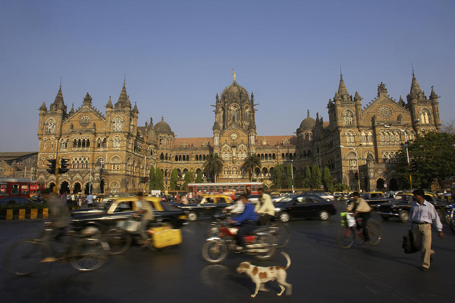 India, Mumbai, Chhatrapati Shivaji Terminus, pedestrians in foreground Photograph by Thomas Brown