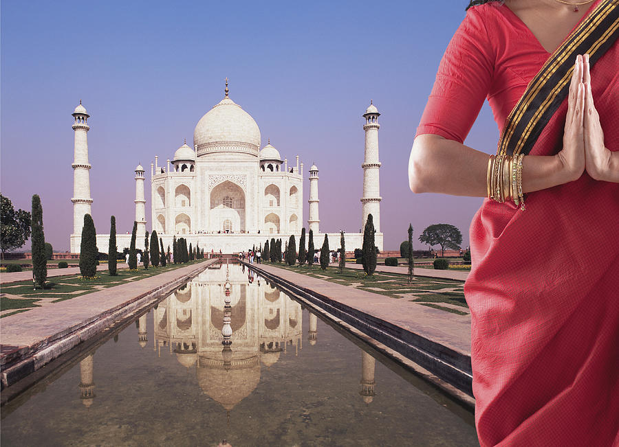 Indian woman in traditional clothing near the Taj Mahal Photograph by Jacobs Stock Photography Ltd