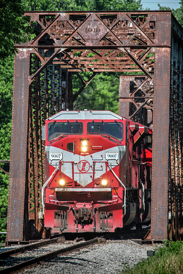 Indiana Railroad 9007 crosses over the Wabash River Photograph by Jim Pearson