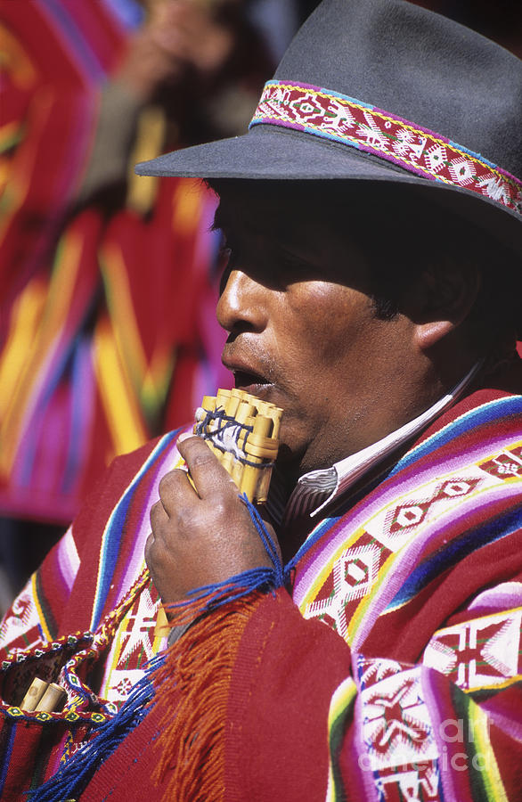 Music Photograph - Indigenous panpipe musician by James Brunker