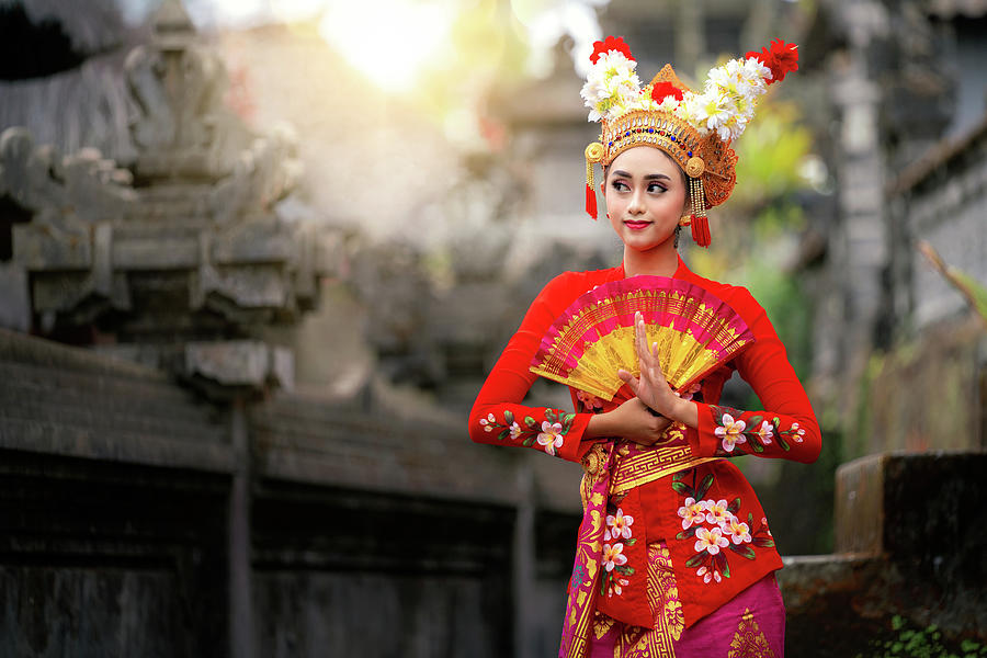 Indonesian girl with traditional costumn dance in bali temple Photograph by Anek Suwannaphoom