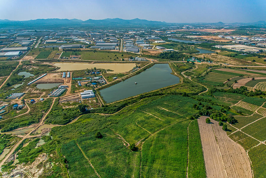 Industrial estate development and Farming Aerial photography Photograph by Praethip
