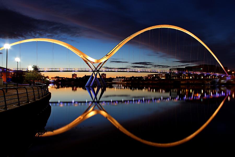 Infinity bridge reflection Photograph by John Mannick - Fine Art America