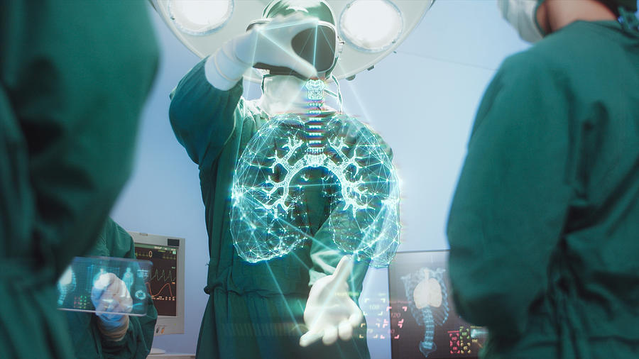 Innovation and Medical technology Concept, Surgeons Team using hi-tech modern virtual reality simulator interface with Hologram diagnose Respiratory System in the operating room Photograph by Cofotoisme