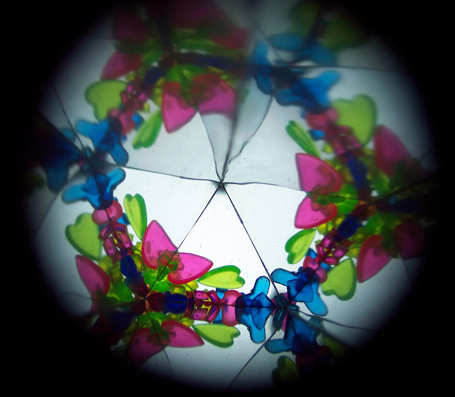 Inside a kaleidoscope, abstract images in blue, green, pink Photograph by Travelpixpro