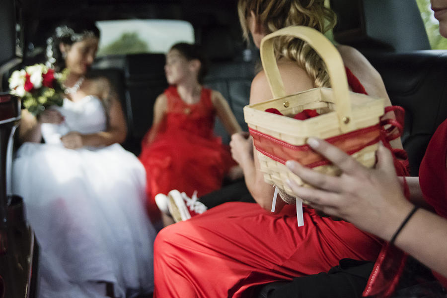 Inside limousine on the way for millennial wedding. Photograph by Martinedoucet
