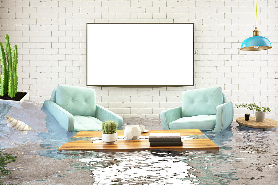Insurance Concept. House Flooded Photograph by Asbe