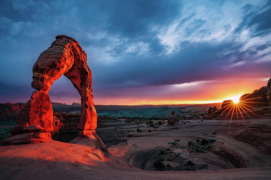 Intense Red Delicate Arch Sunset Photograph by Rose and Charles Cox