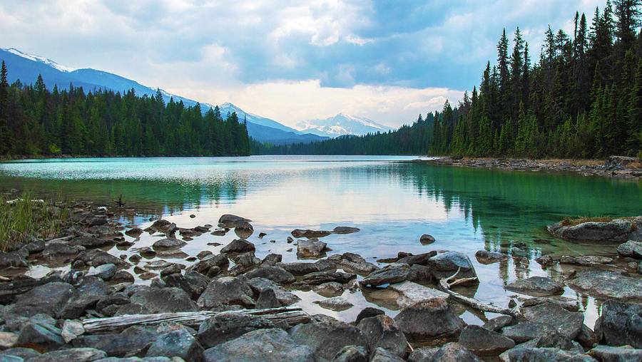 Interior lake in British Columbia waking up with calm water and nobody ...