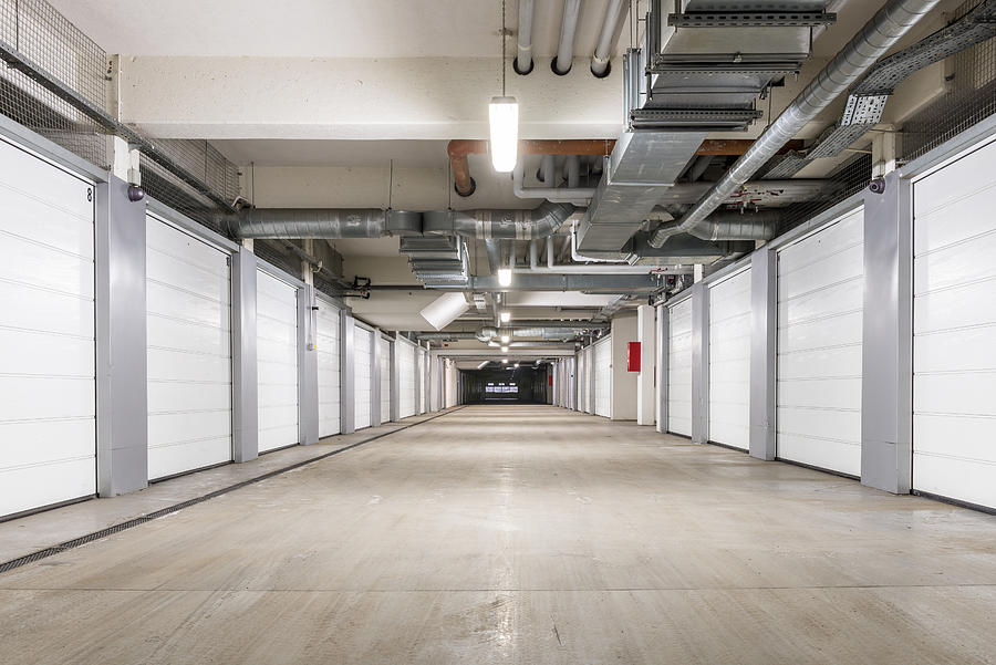 Interior of underground parking garage in Europe Photograph by Jeff_Baumgart