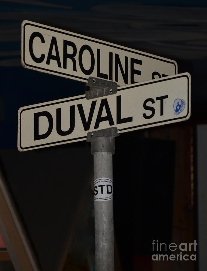 Intersection Of Caroline And Duval Streets Photograph by Bob Sample