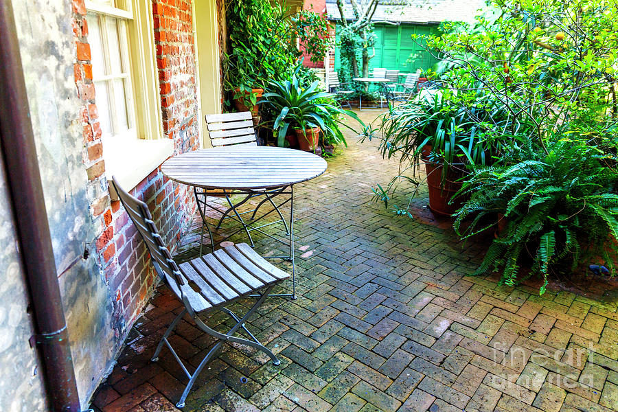 Into the New Orleans Secret Courtyard Photograph by John Rizzuto