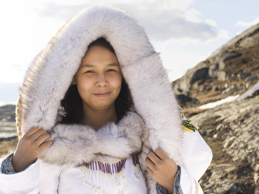 Inuit woman in traditional dress on Baffin Island Photograph by RyersonClark