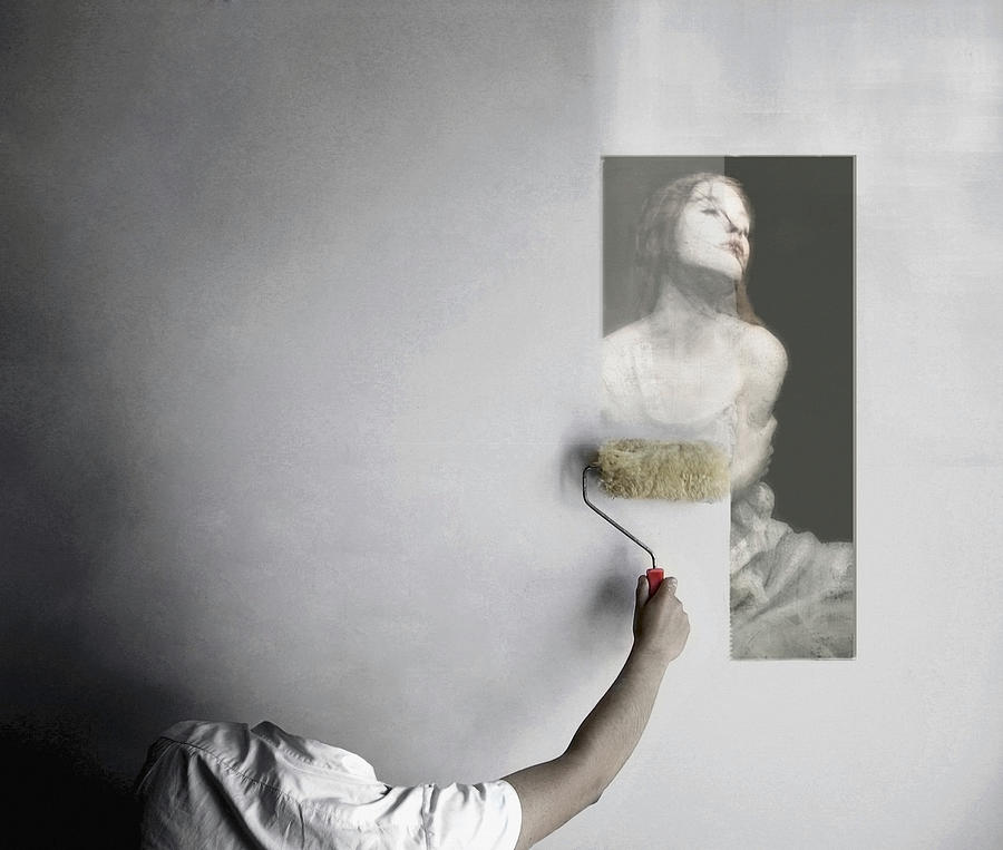 Invisible man erasing an image from the wall Photograph by Hans Neleman