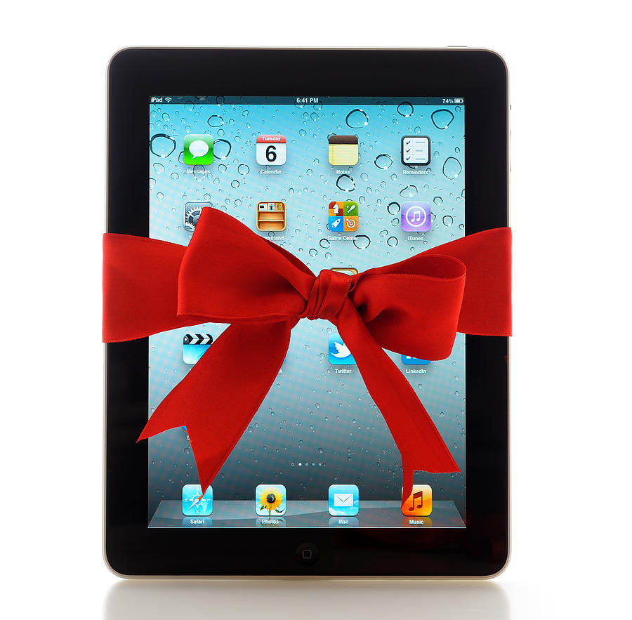 iPad with red ribbon Photograph by Hocus-focus
