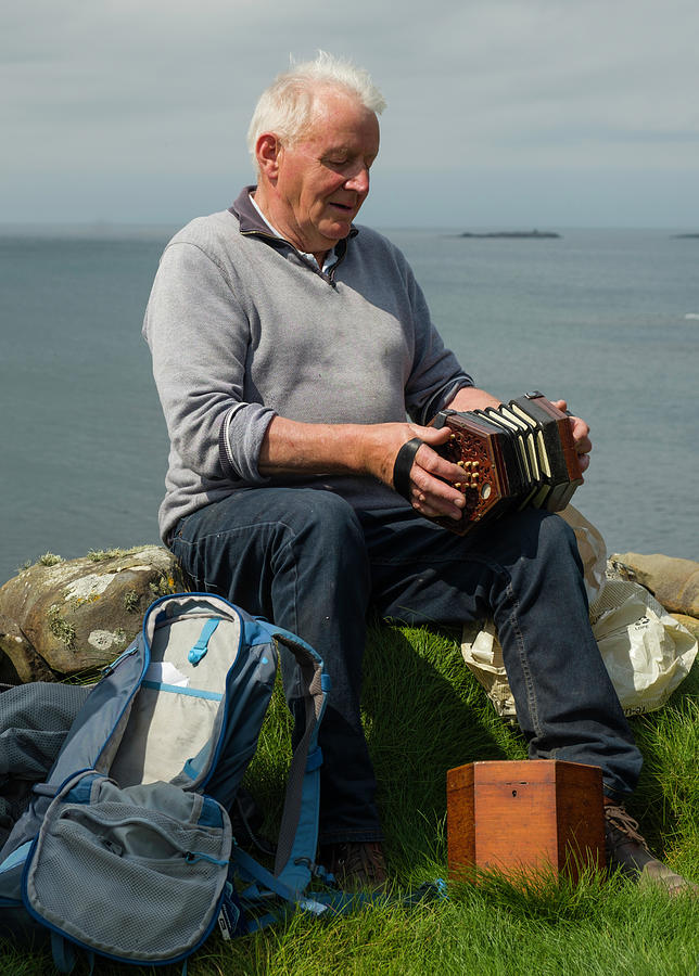 Irish guide playing a Concertina Photograph by David L Moore