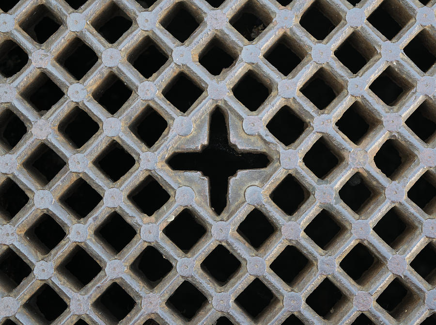 Iron Sewer Grate Background Photograph by Photonew