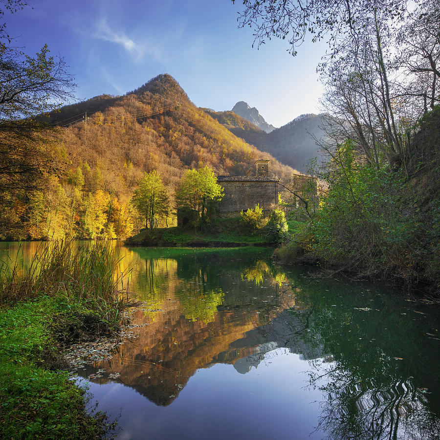 Isola Santa village and lake in autumn foliage. Italy Photograph by Stefano Orazzini