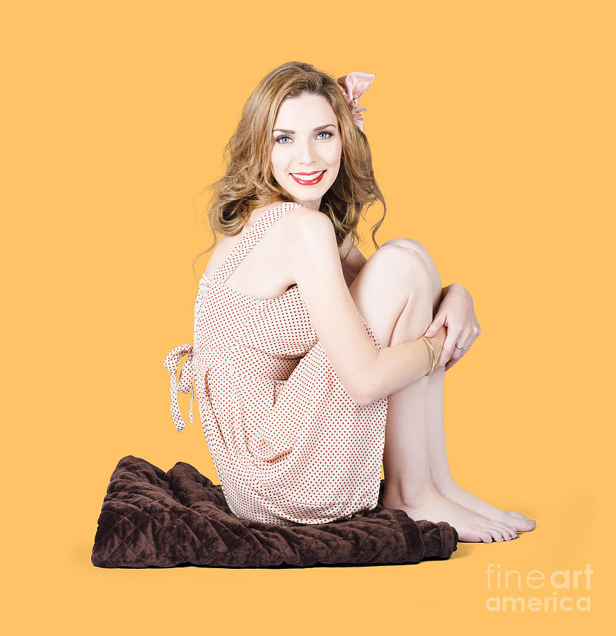 Isolated pinup girl sitting on soft blanket Photograph by Jorgo Photography