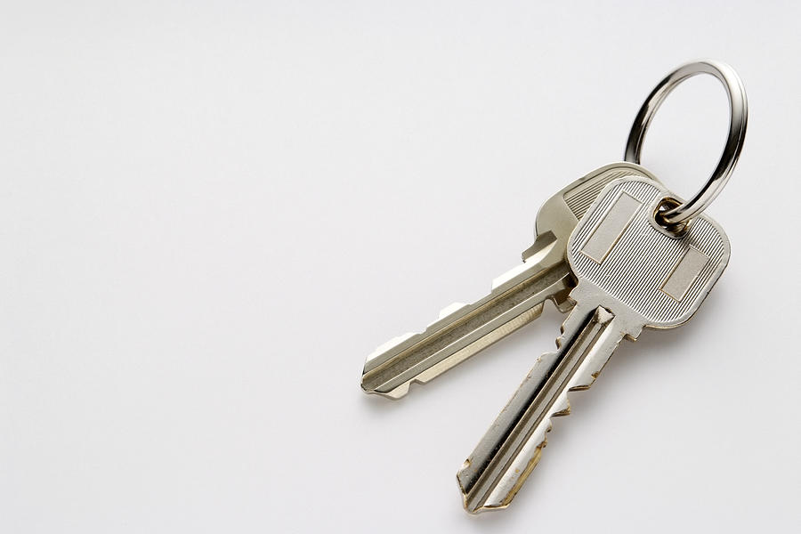 Isolated shot of Keys on white background with copy space Photograph by Kyoshino