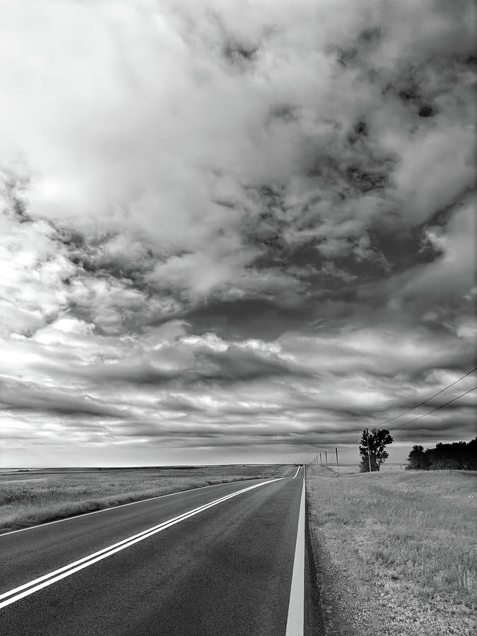 Isolation - Highway On The Plains black and white photograph Photograph by Ann Powell