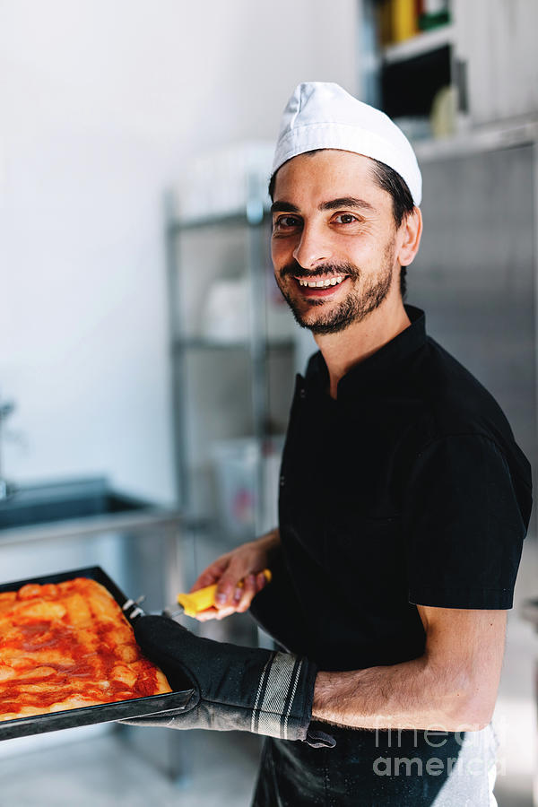 Italian Chef Pizzaiolo Putting Pizza To Oven In Restaurant Kitchen Photograph By Michal Bednarek 3845