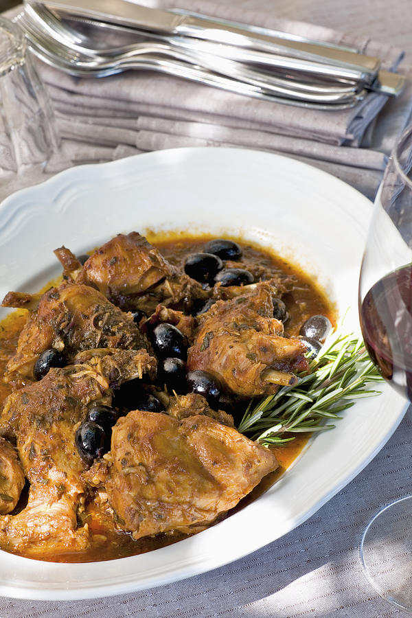 Italian coniglio e olive or rabbit and olives Photograph by John Rizzo
