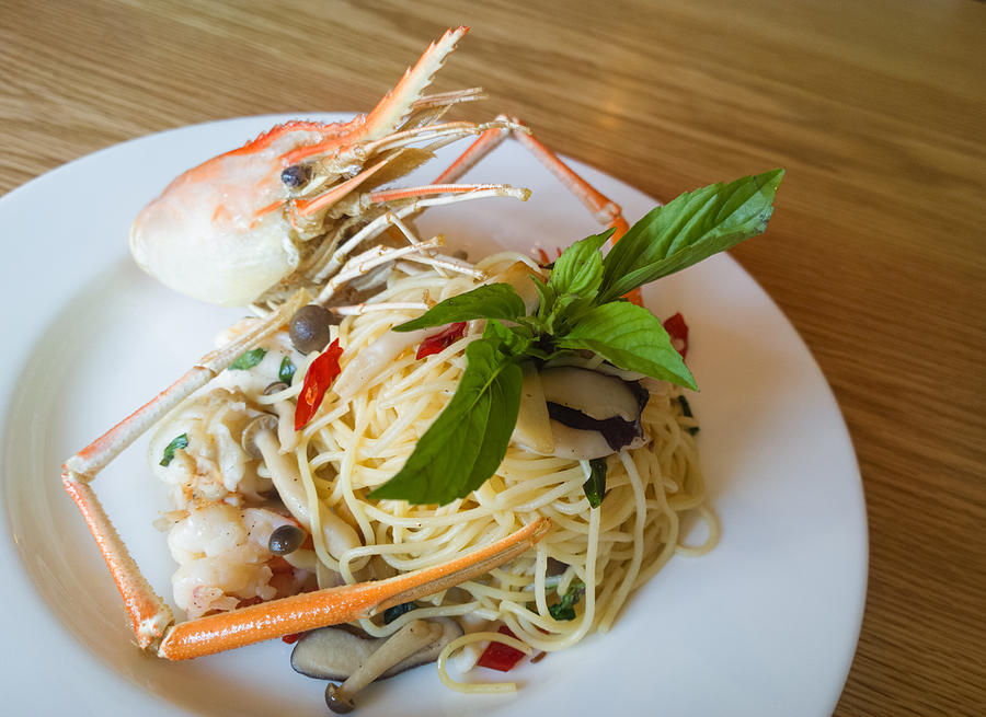 Italian Spaghetti Pasta And Fresh Spicy Shrimps Sauce On Wooden Photograph by Everythingpossible
