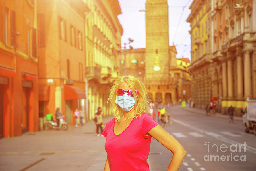 Italian woman with face mask at sunset Photograph by Benny Marty