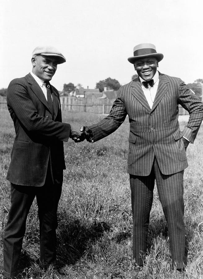 Jack Johnson Shaking Hands With Tut Jackson Circa 1922 Photograph by War Is Hell Store
