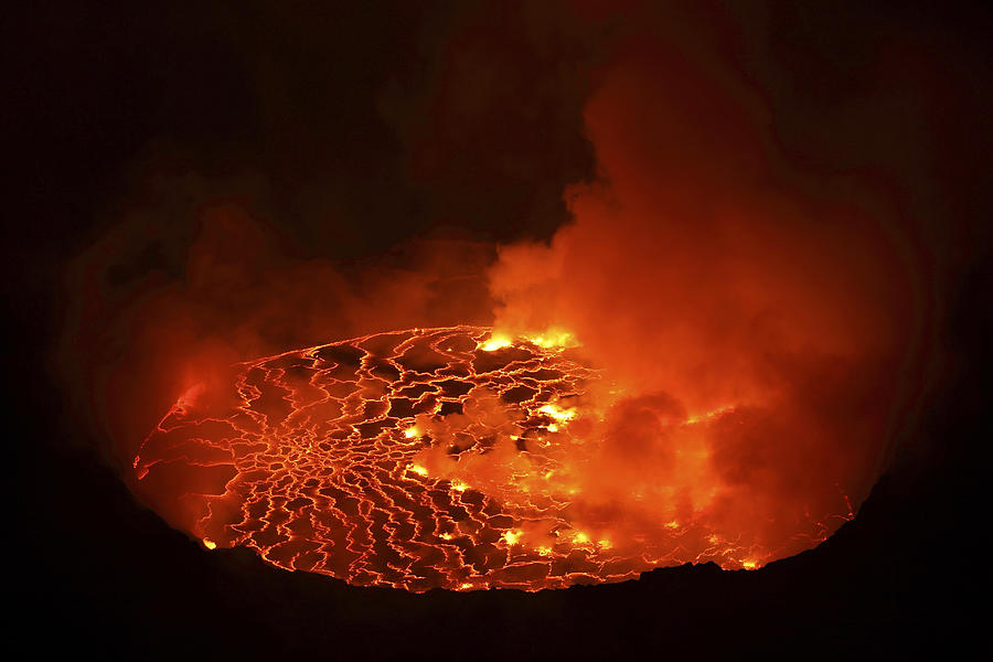 January 21, 2011 - Nighttime view of lava lake in pit crater, Nyiragongo Volcano, Democratic Republic of the Congo. Photograph by Stocktrek Images/Richard Roscoe
