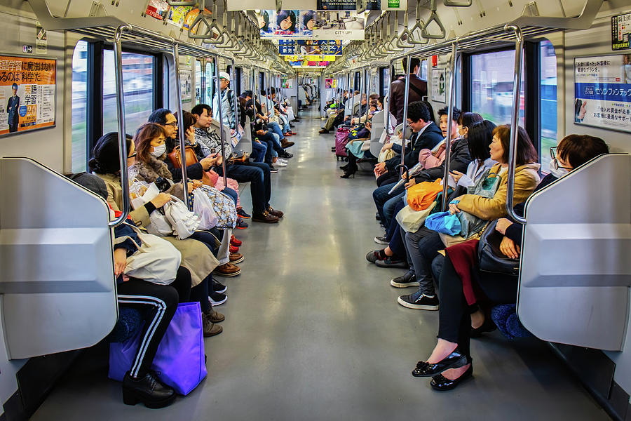 Japanese Commute Photograph by Bill Chizek