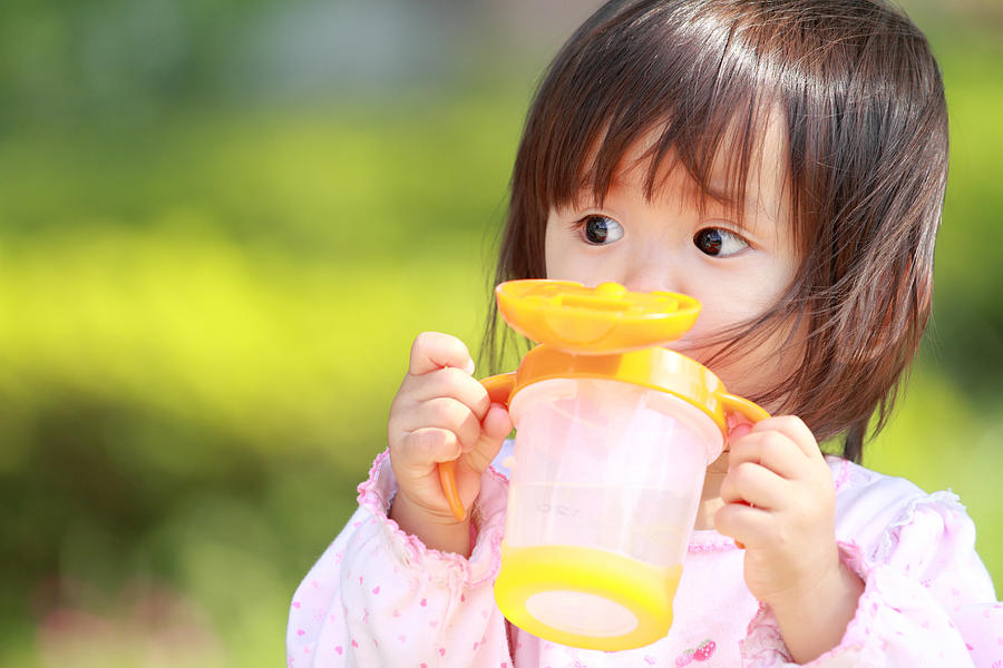 Japanese girl drinking water (1 year old) Photograph by Ziggy_mars