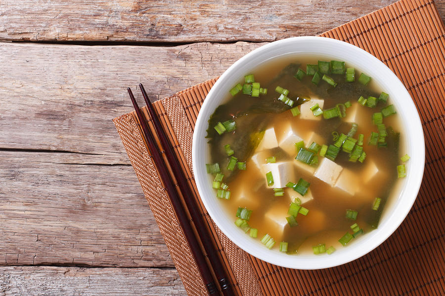 Japanese miso soup in a white bowl horizontal top view Photograph by Alleko
