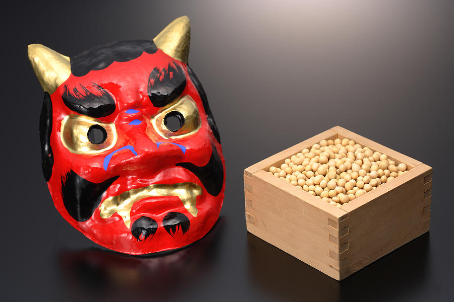Japanese Oni devil mask with box of edamame soybeans Photograph by Hideki Yoshihara/Aflo