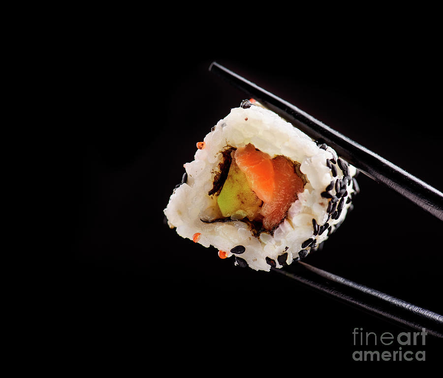 Japanese sushi roll on black background Photograph by Jelena Jovanovic