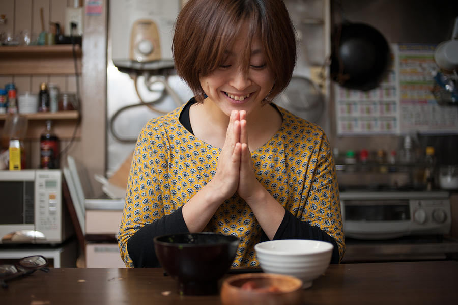 Japanese woman praying after eat Photograph by Toshiro Shimada