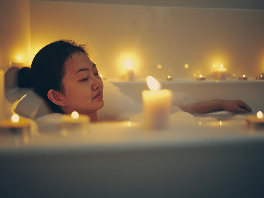 Japanese Woman Taking a Candlelight Bath Photograph by RichLegg