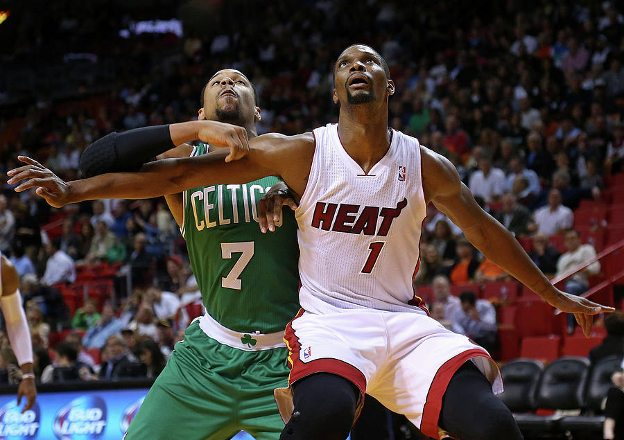 Jared Sullinger and Chris Bosh Photograph by Mike Ehrmann